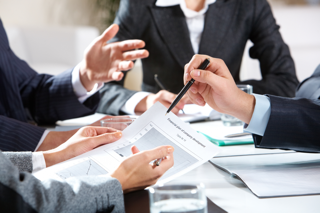 Business Professionals and Lawyers Reviewing Contracts